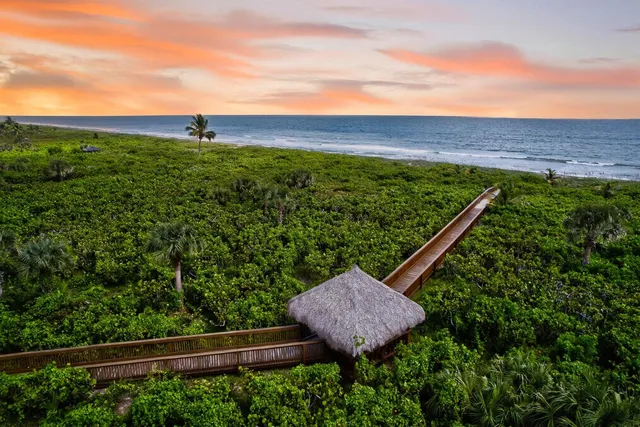 a view of a back yard from a balcony