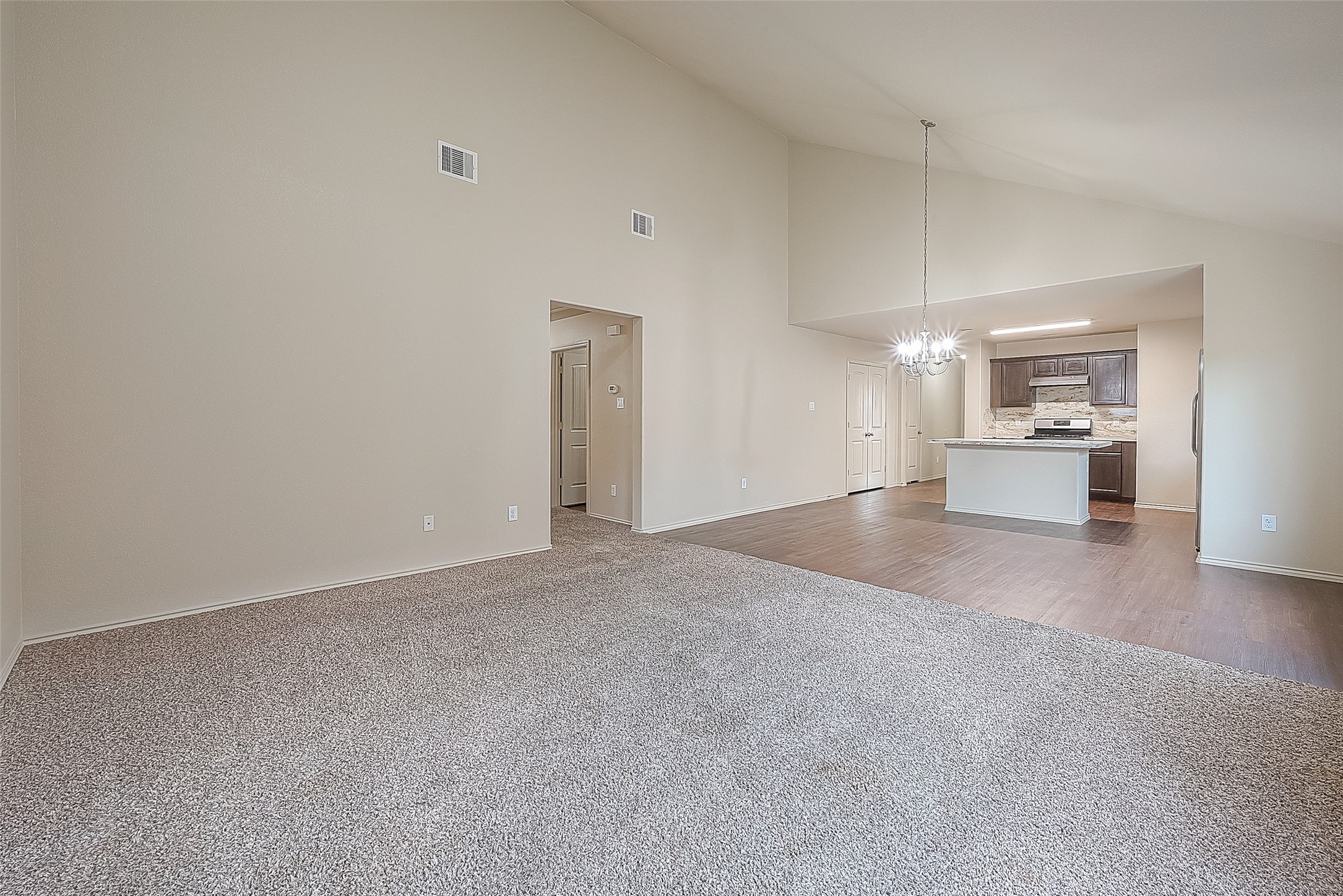 2038 Treasure Mountain Drive Spring, TX 77388 - Photo 15 of 45 a view of a kitchen with a sink and a refrigerator
