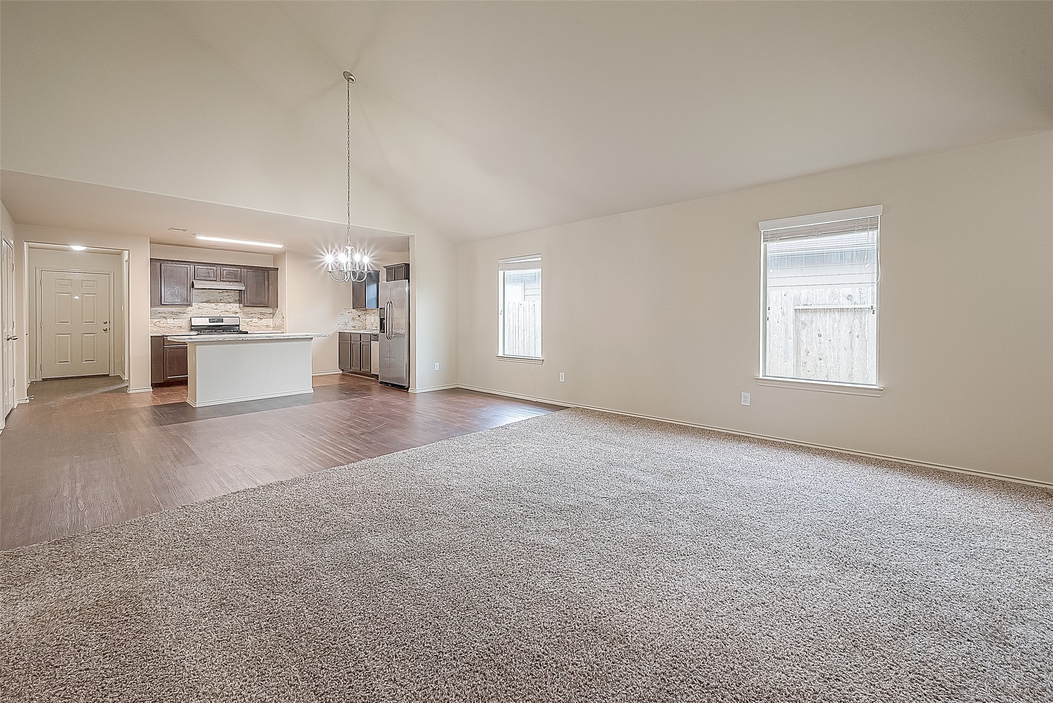 2038 Treasure Mountain Drive Spring, TX 77388 - Photo 16 of 45 a view of a kitchen with a sink and a stove top oven