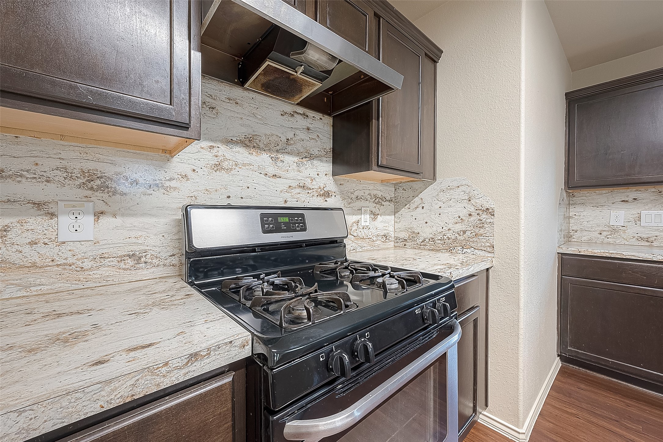 2038 Treasure Mountain Drive Spring, TX 77388 - Photo 20 of 45 a stove top oven sitting inside of a kitchen