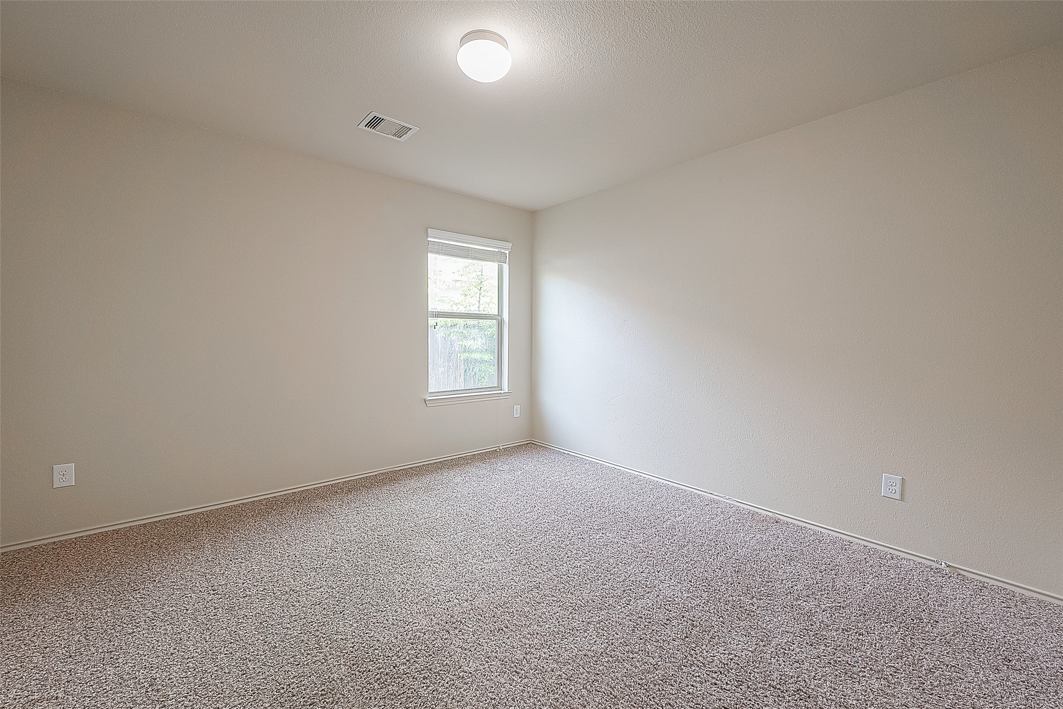 2038 Treasure Mountain Drive Spring, TX 77388 - Photo 25 of 45 an empty room with windows