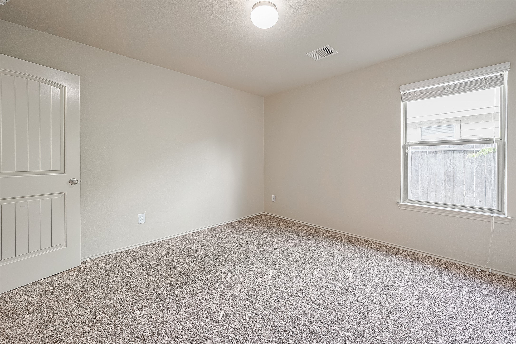 2038 Treasure Mountain Drive Spring, TX 77388 - Photo 26 of 45 a view of an empty room with a window