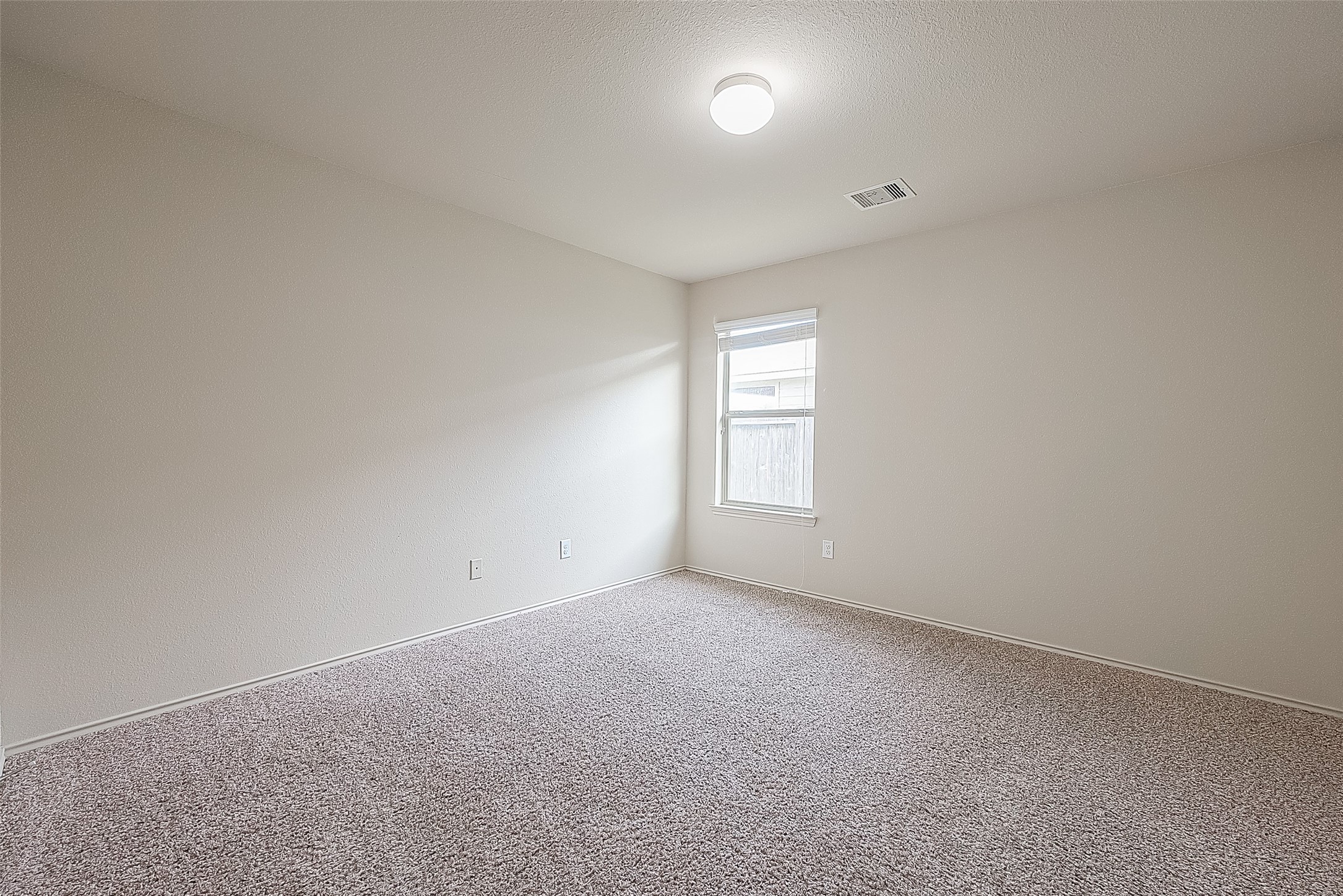 2038 Treasure Mountain Drive Spring, TX 77388 - Photo 28 of 45 an empty room with a window