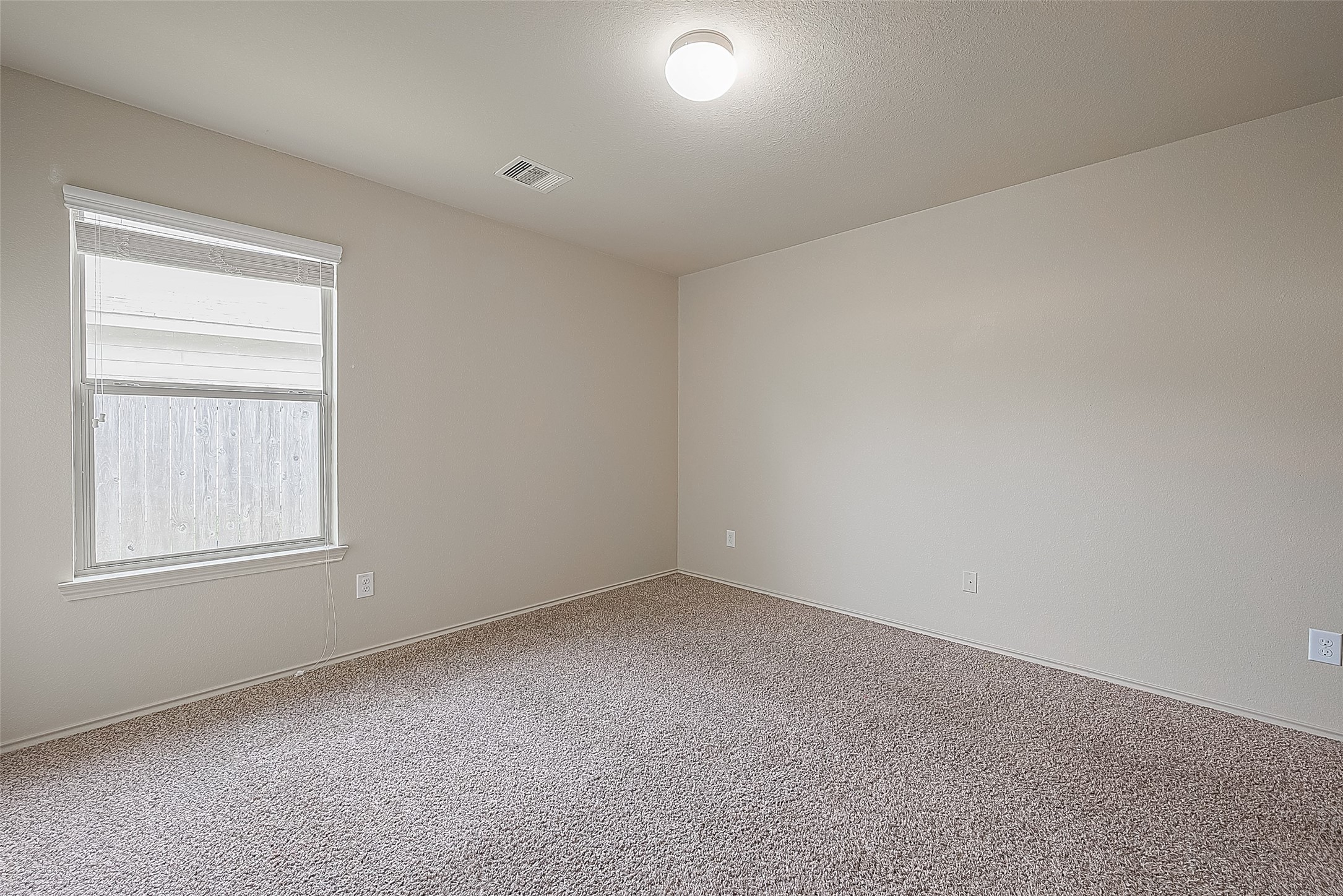 2038 Treasure Mountain Drive Spring, TX 77388 - Photo 29 of 45 an empty room with a window