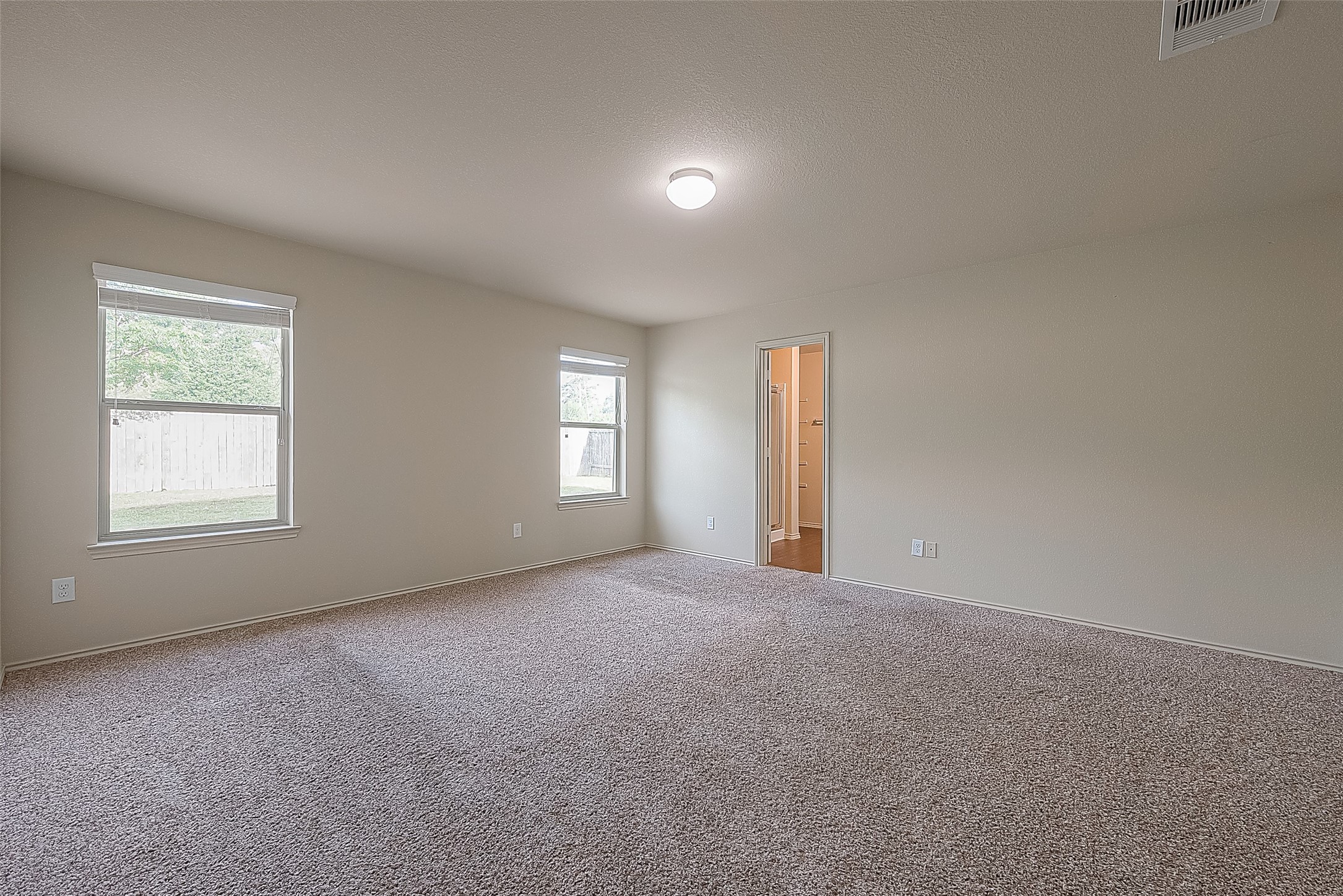 2038 Treasure Mountain Drive Spring, TX 77388 - Photo 34 of 45 a view of an empty room with a window