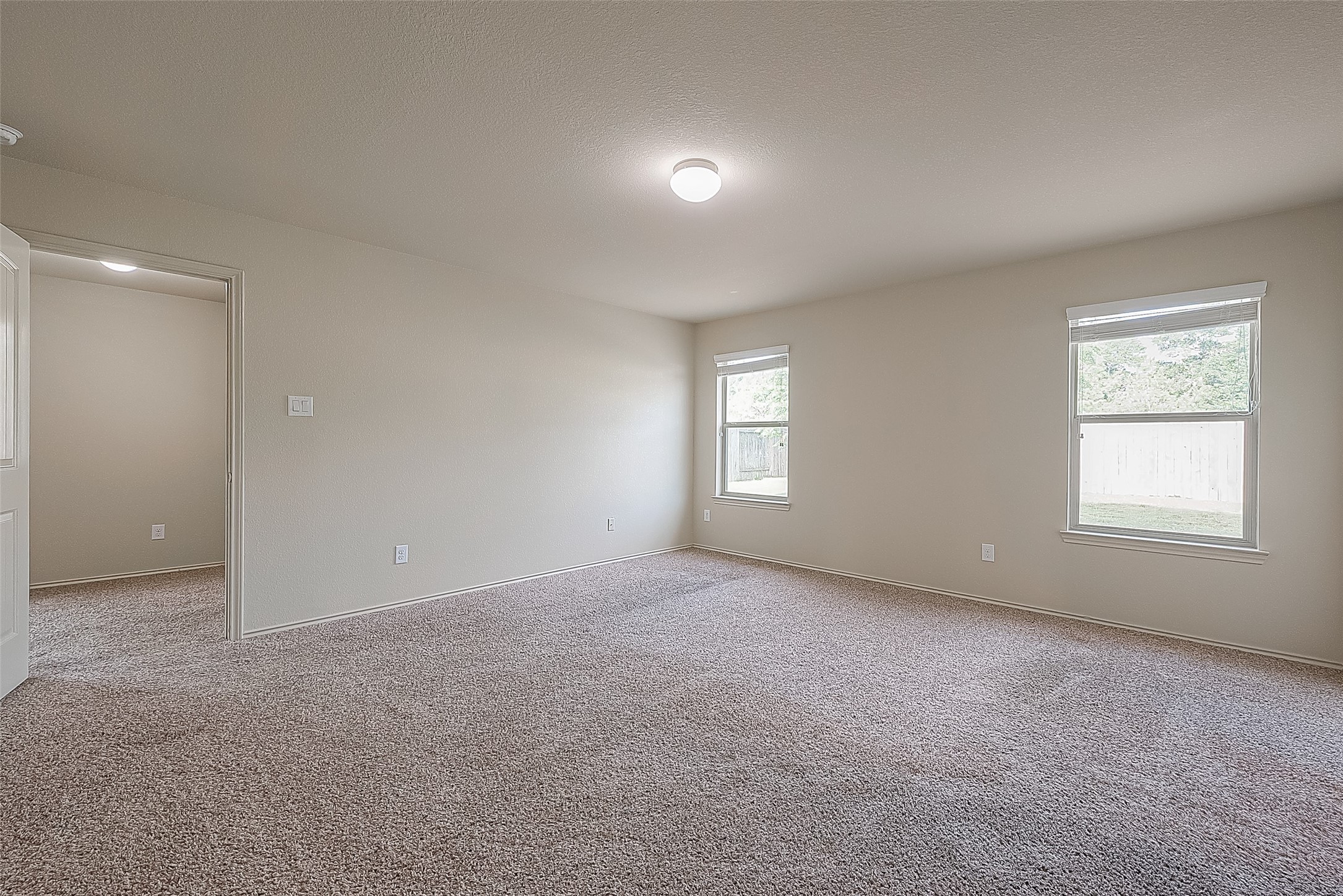 2038 Treasure Mountain Drive Spring, TX 77388 - Photo 35 of 45 an empty room with windows