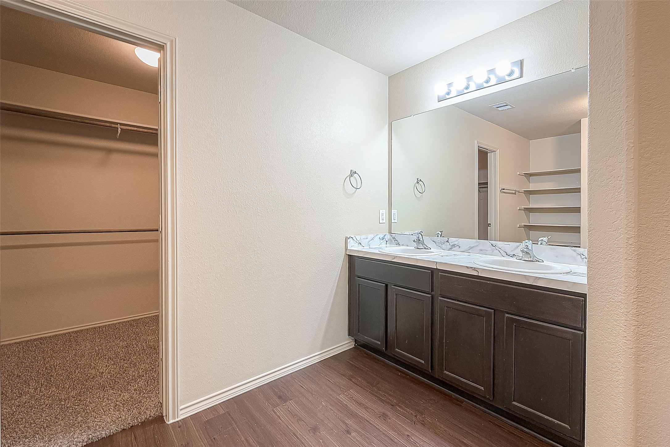 2038 Treasure Mountain Drive Spring, TX 77388 - Photo 37 of 45 a bathroom with a granite countertop sink and a mirror