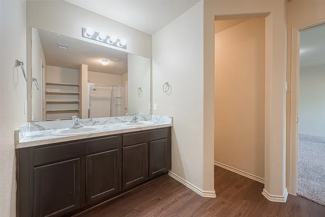 a view of a room with racks on the wall