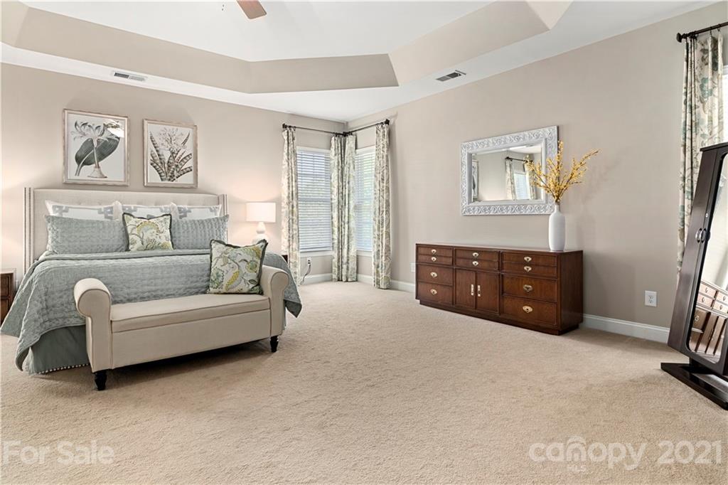 1933 Faison Avenue, Unit 69 Fort Mill, SC 29708 - Photo 17 of 40 a living room with furniture a bed and a couch