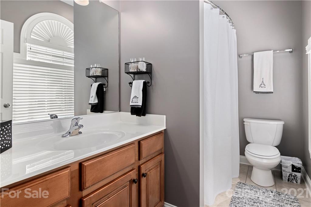 1933 Faison Avenue, Unit 69 Fort Mill, SC 29708 - Photo 22 of 40 a bathroom with a sink and a toilet