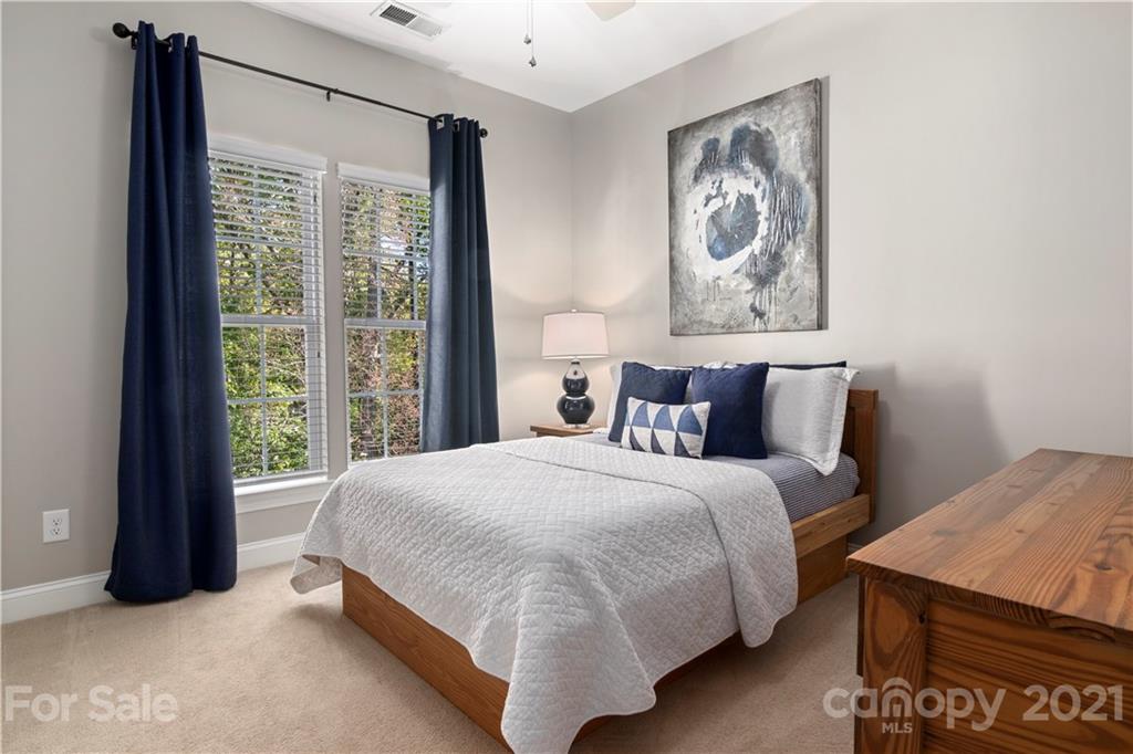 1933 Faison Avenue, Unit 69 Fort Mill, SC 29708 - Photo 24 of 40 a bedroom with a bed and a window