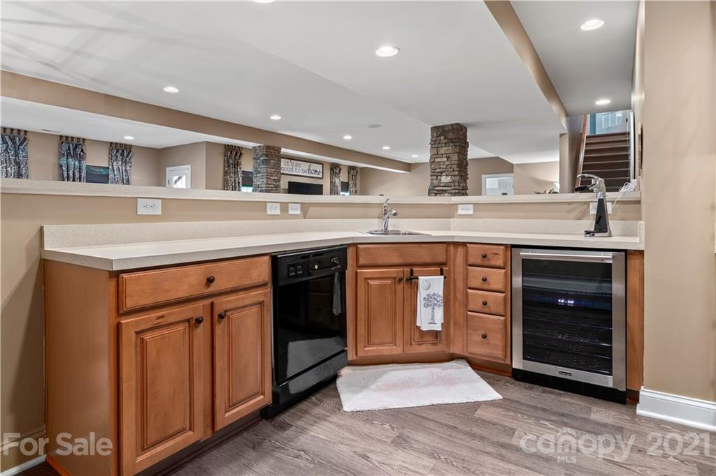 1933 Faison Avenue, Unit 69 Fort Mill, SC 29708 - Photo 27 of 40 a kitchen with a sink and cabinets