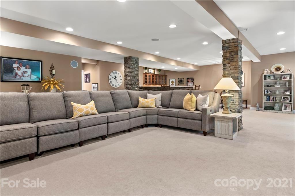 1933 Faison Avenue, Unit 69 Fort Mill, SC 29708 - Photo 28 of 40 a living room with furniture and a couch