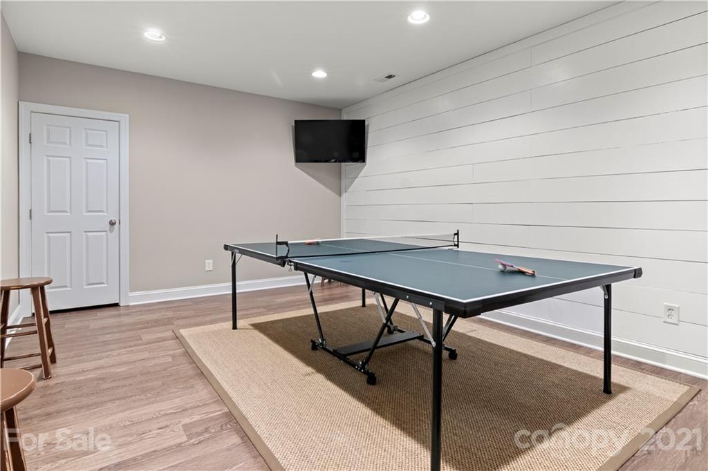 1933 Faison Avenue, Unit 69 Fort Mill, SC 29708 - Photo 30 of 40 a living room with stainless steel appliances kitchen island a table and chair