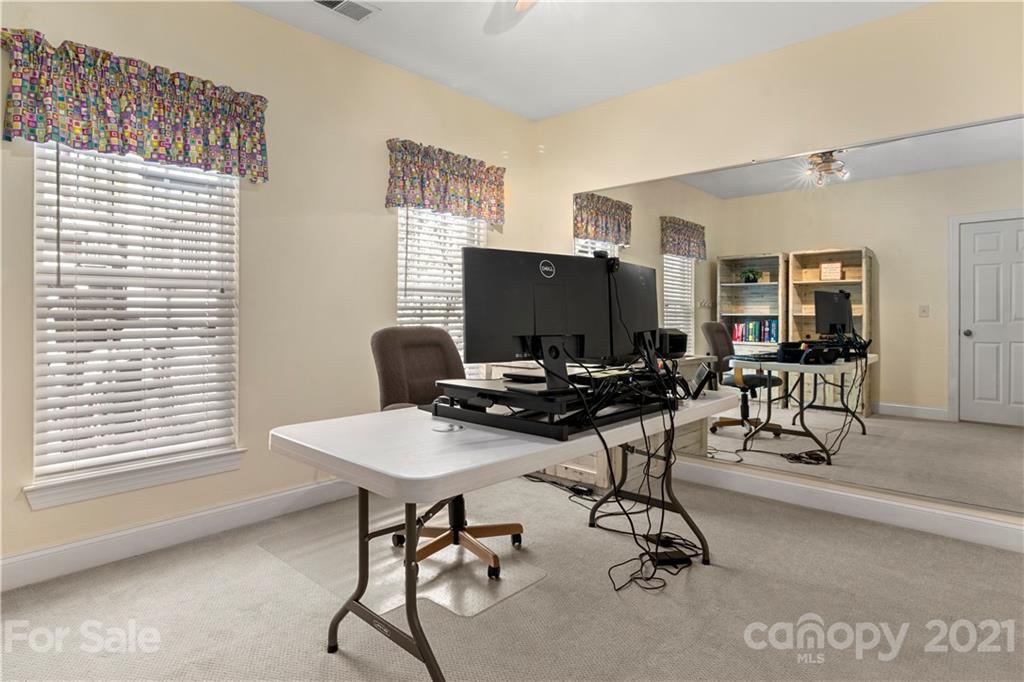 1933 Faison Avenue, Unit 69 Fort Mill, SC 29708 - Photo 31 of 40 a view of a workspace with furniture and a window