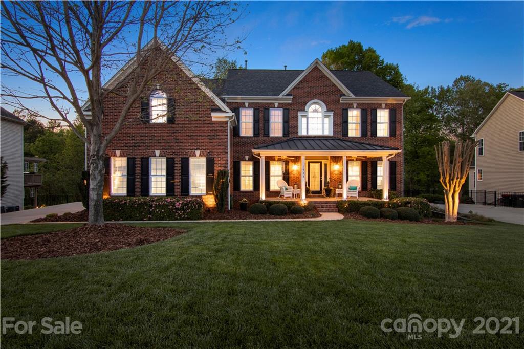 1933 Faison Avenue, Unit 69 Fort Mill, SC 29708 - Photo 39 of 40 a front view of a house with a garden