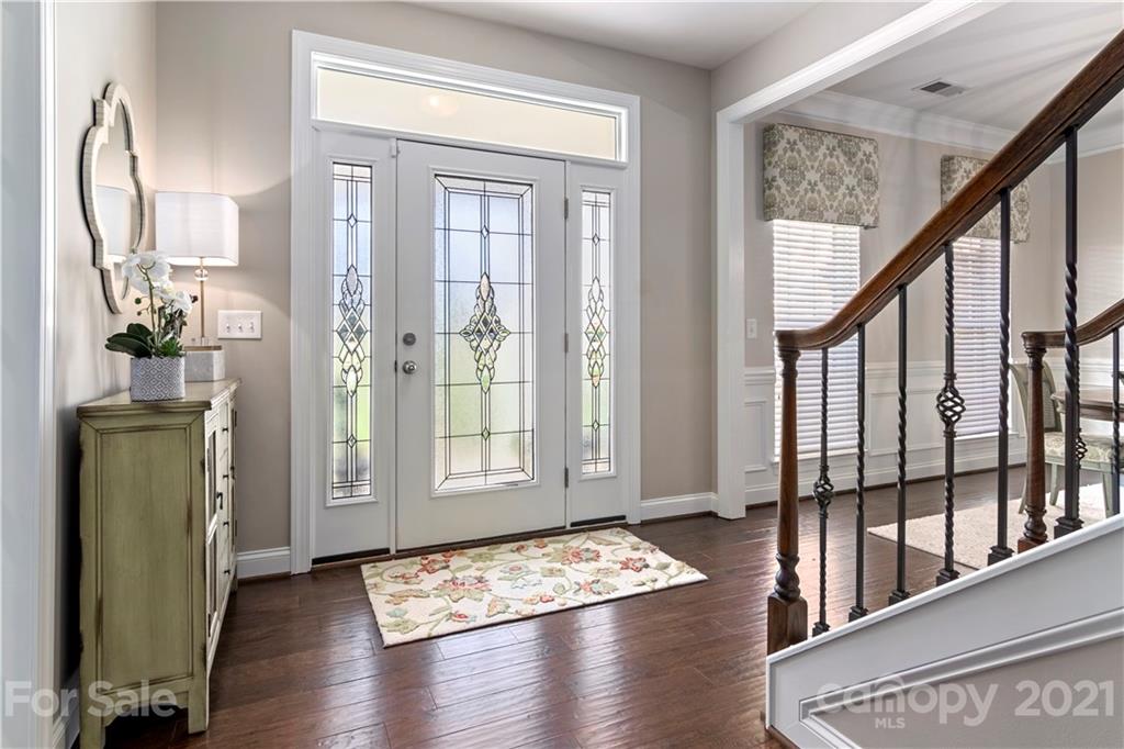 1933 Faison Avenue, Unit 69 Fort Mill, SC 29708 - Photo 5 of 40 a view of an entryway with wooden floor and door