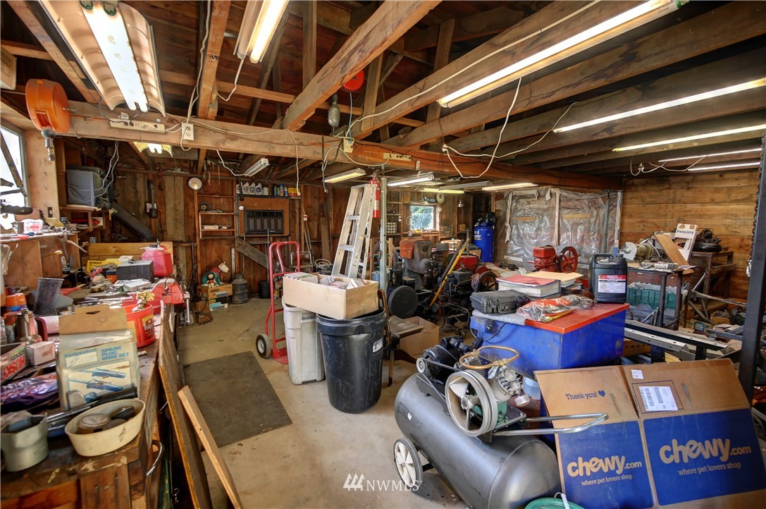 628 Twisp Carlton Road Twisp, WA 98856 - Photo 26 of 32 a view of a storage room with racks