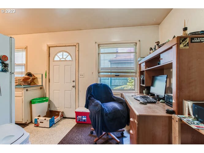 11 Northeast 62nd Avenue Portland, OR 97213 - Photo 13 of 28 a living room with furniture and a window