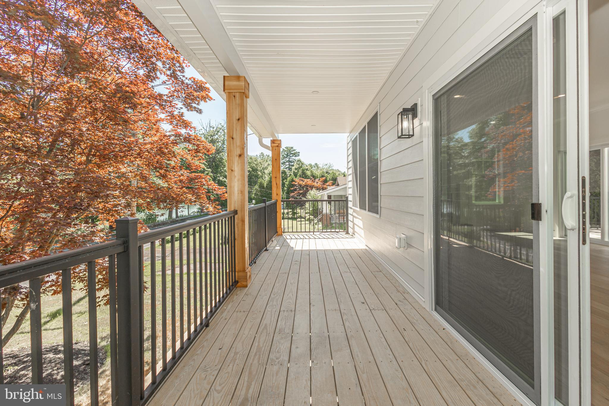 1764 River Road Upper Black Eddy, PA 18972 - Photo 12 of 37 a view of a balcony with wooden floor