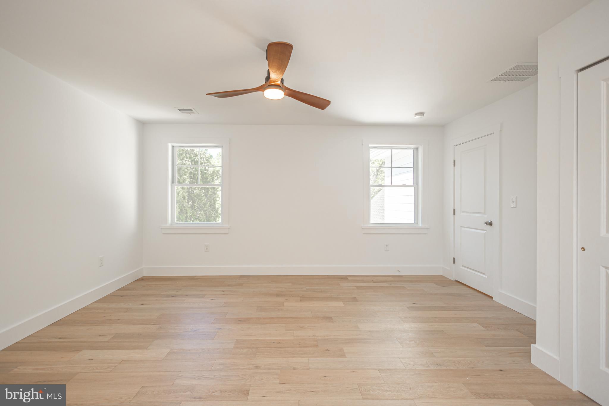 1764 River Road Upper Black Eddy, PA 18972 - Photo 27 of 37 wooden floor in an empty room with a window
