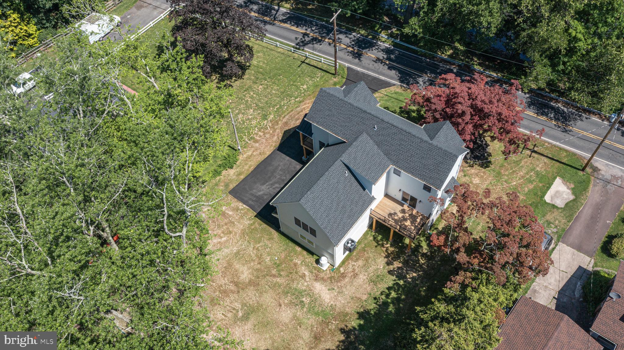 1764 River Road Upper Black Eddy, PA 18972 - Photo 33 of 37 an aerial view of a house with a yard