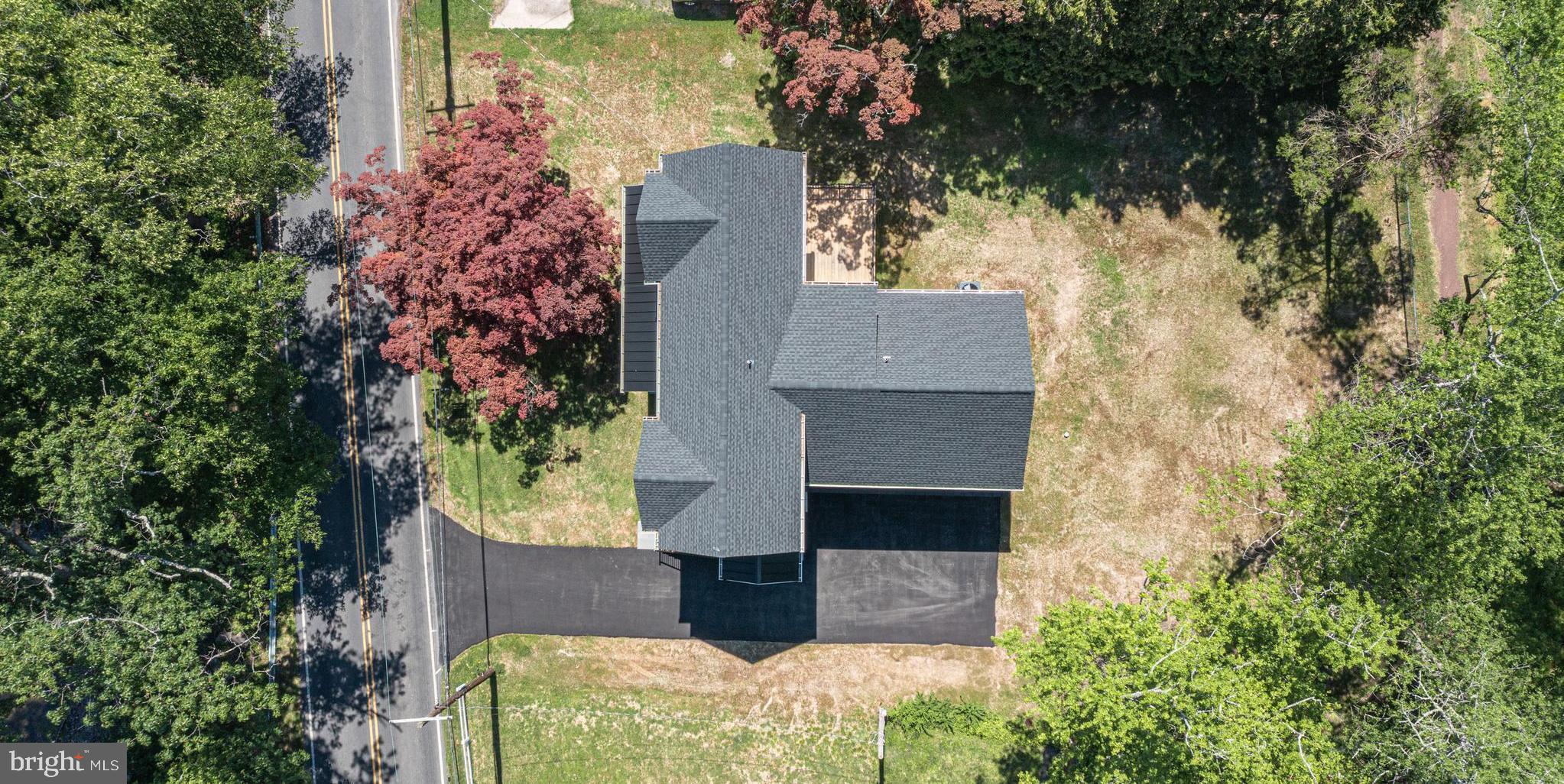 1764 River Road Upper Black Eddy, PA 18972 - Photo 34 of 37 an aerial view of a house with a yard