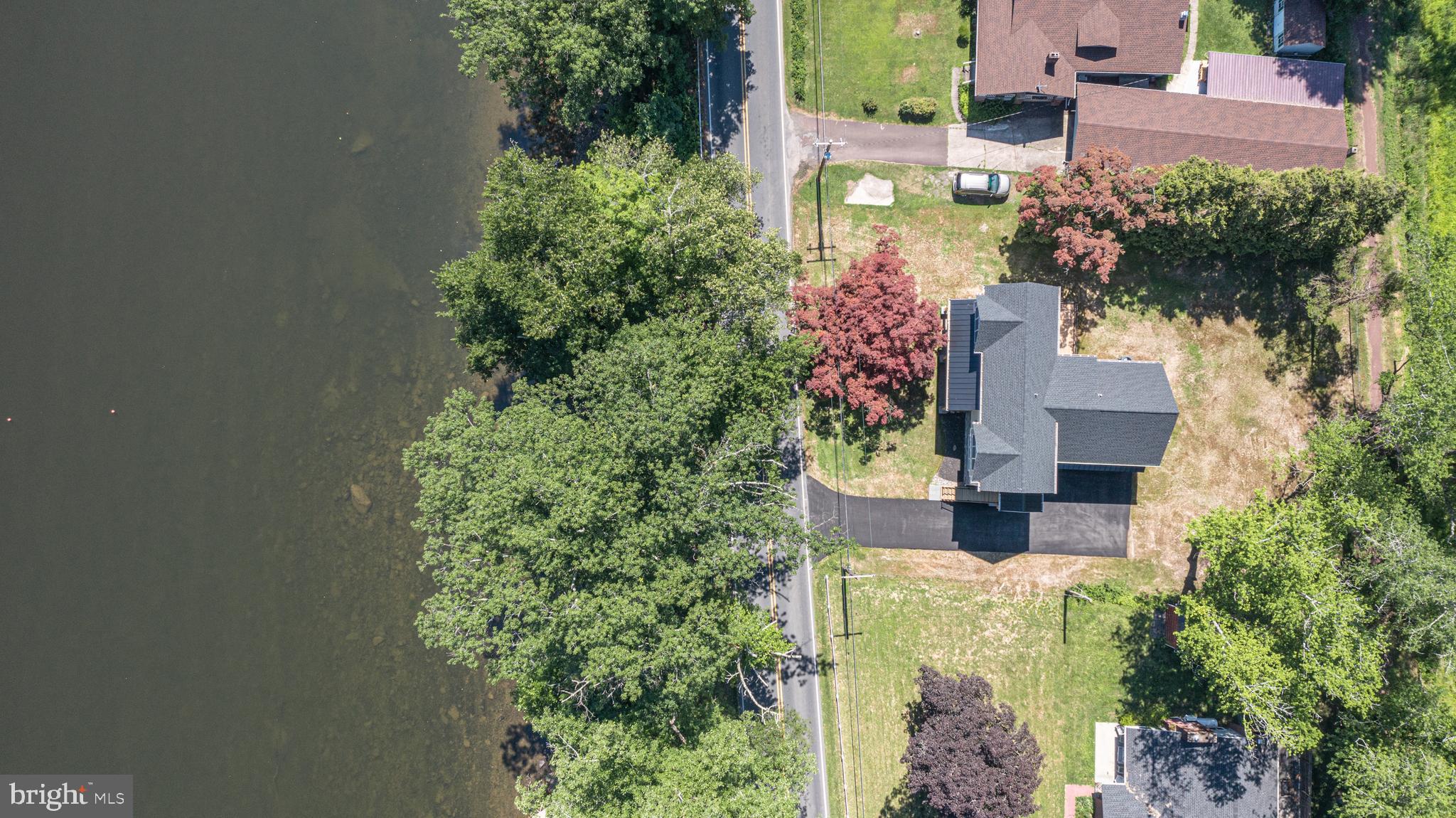 1764 River Road Upper Black Eddy, PA 18972 - Photo 35 of 37 an aerial view of a house with a yard