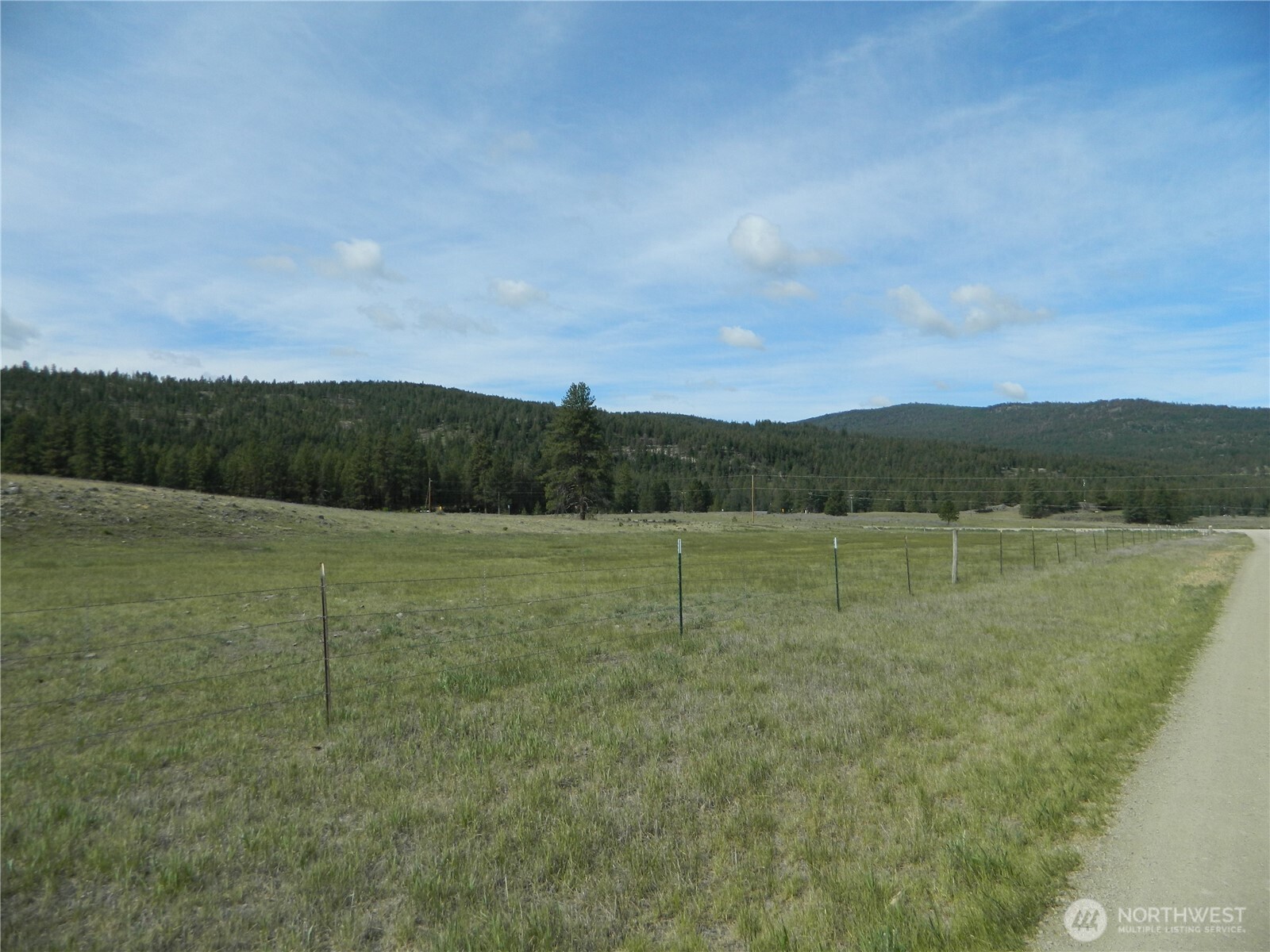 4 Duck Flats Road Tonasket, WA 98855 - Photo 3 of 6 a view of an outdoor space and a yard