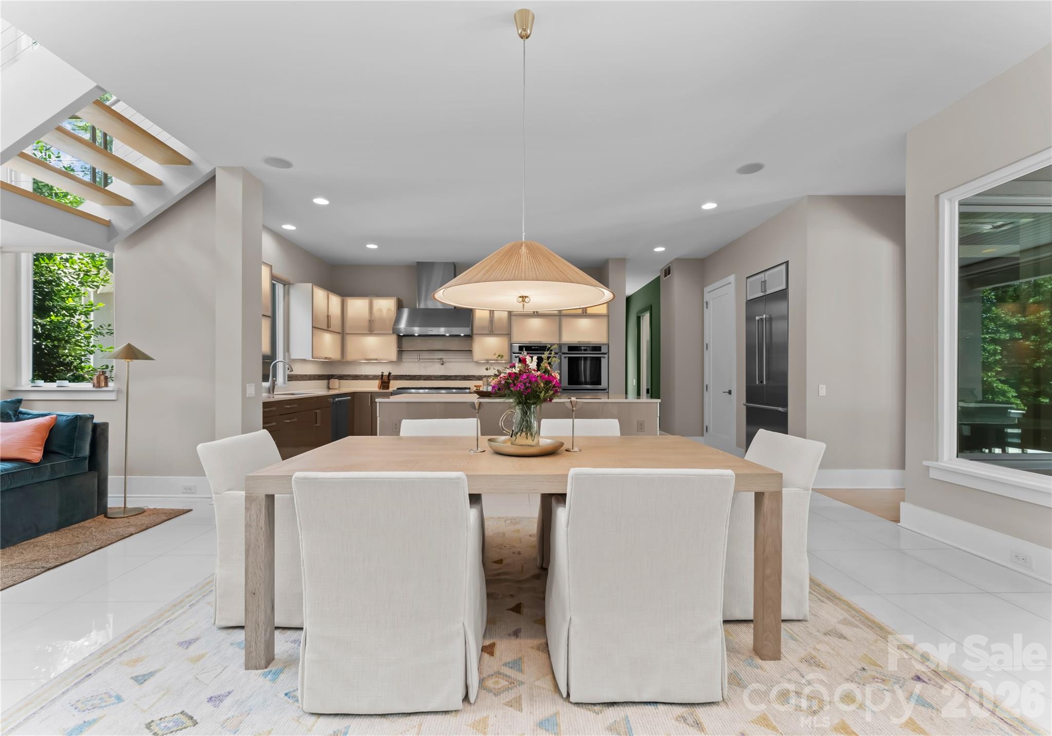 188 Blarney Road Mooresville, NC 28117 - Photo 12 of 48 a living room with kitchen island furniture and a chandelier