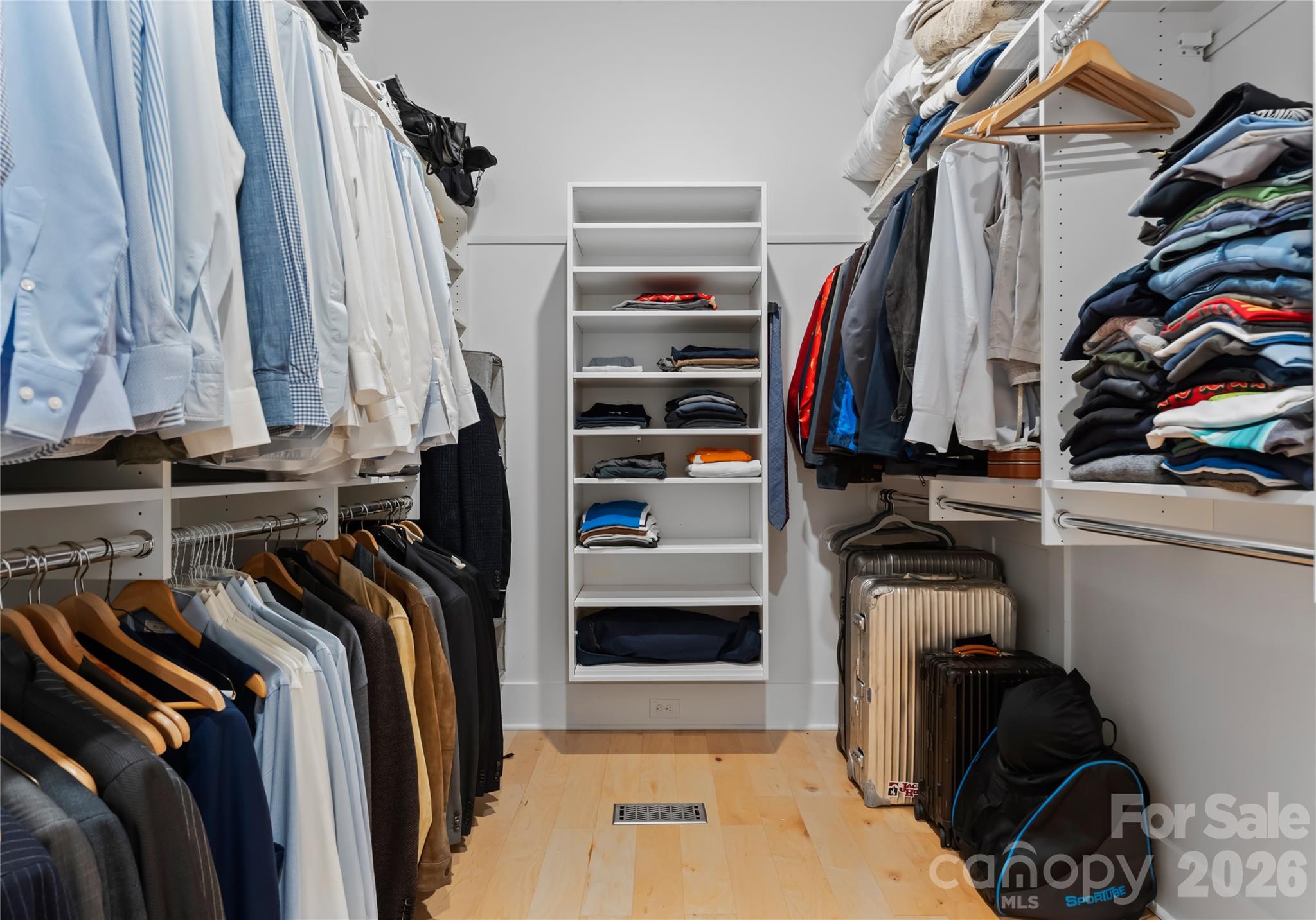 188 Blarney Road Mooresville, NC 28117 - Photo 26 of 48 a view of walk in closet with clothes and shoes