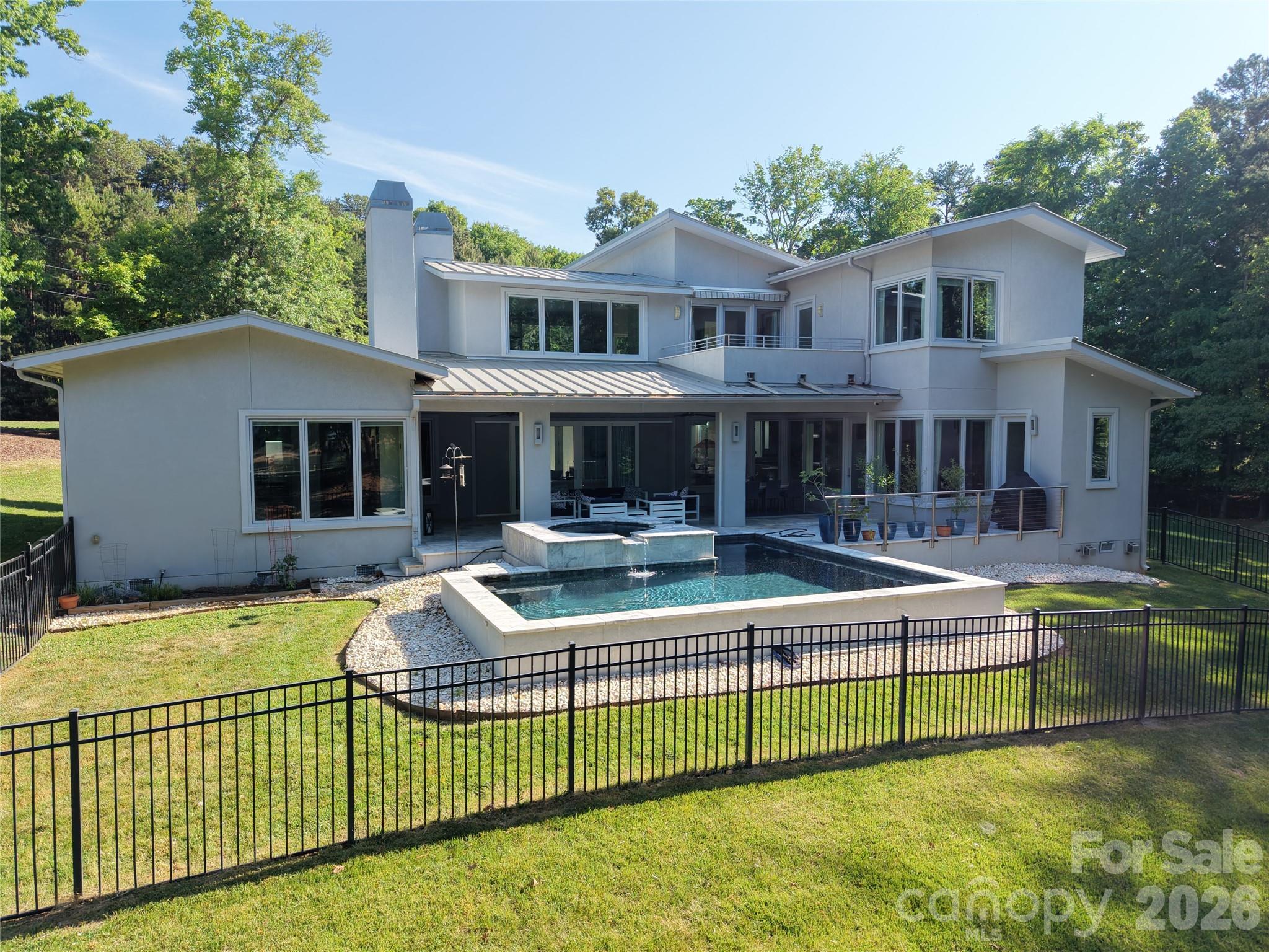 188 Blarney Road Mooresville, NC 28117 - Photo 3 of 48 a view of a house with swimming pool and sitting area