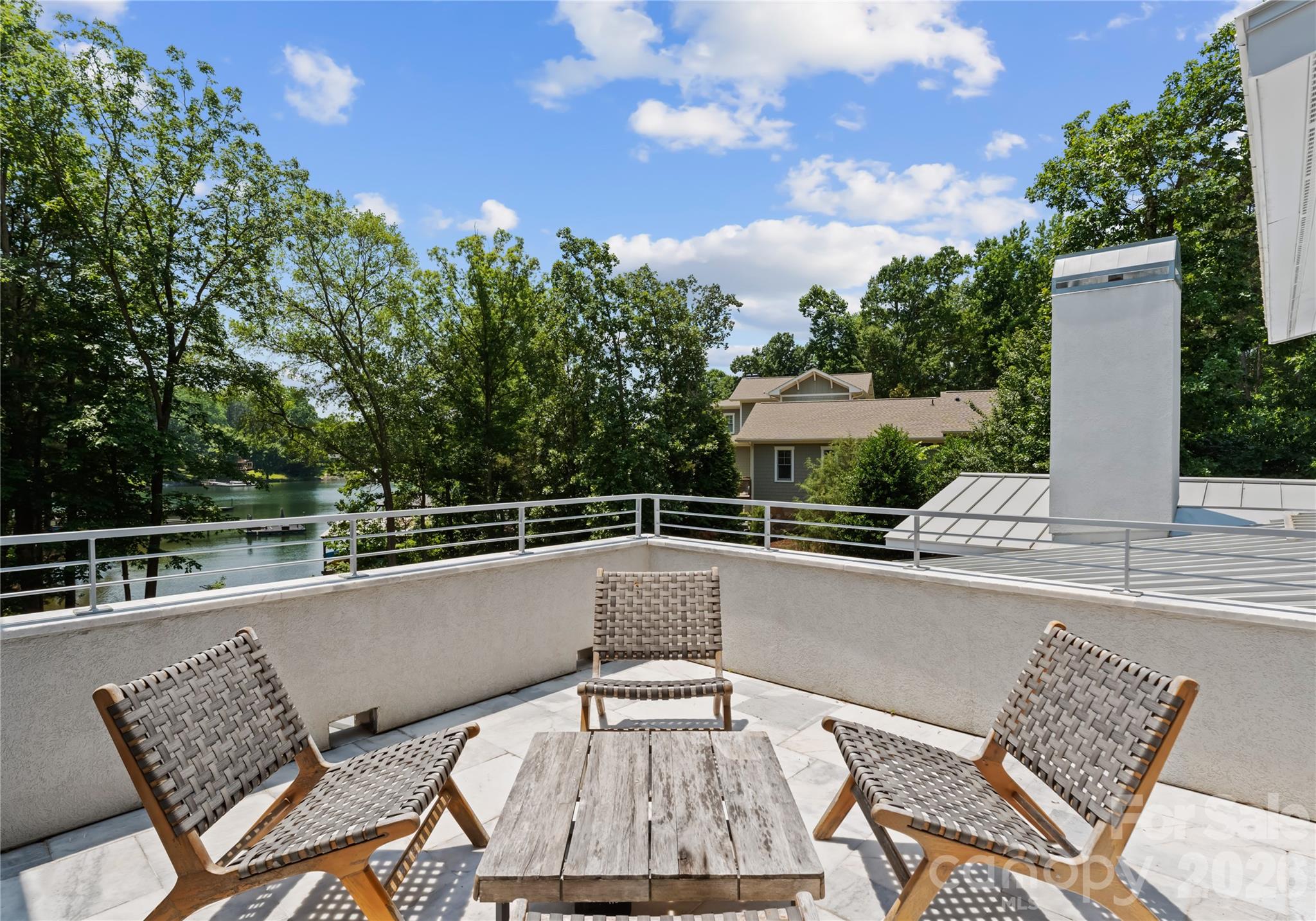 188 Blarney Road Mooresville, NC 28117 - Photo 42 of 48 a view of a chairs and table on the terrace