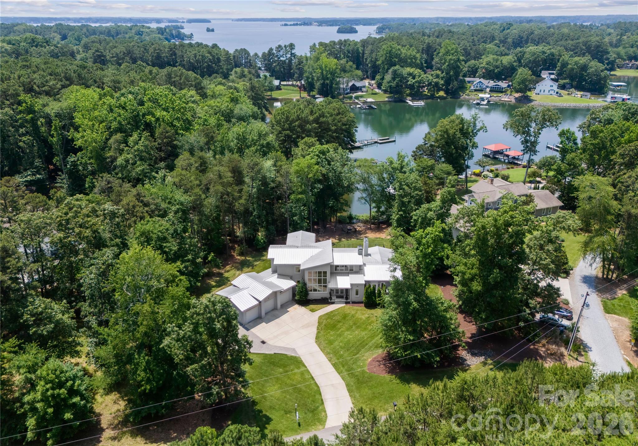 188 Blarney Road Mooresville, NC 28117 - Photo 44 of 48 a view of a lake with a house