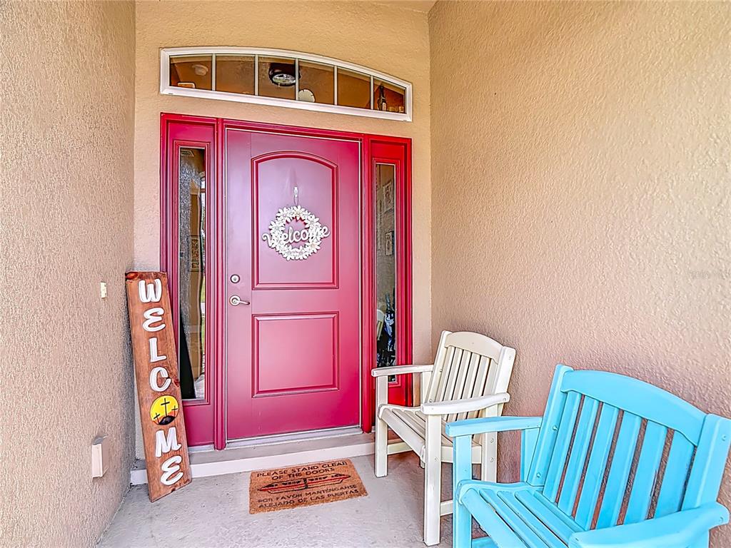 1170 Legatto Loop Dundee, FL 33838 - Photo 4 of 38 a view of front door of house