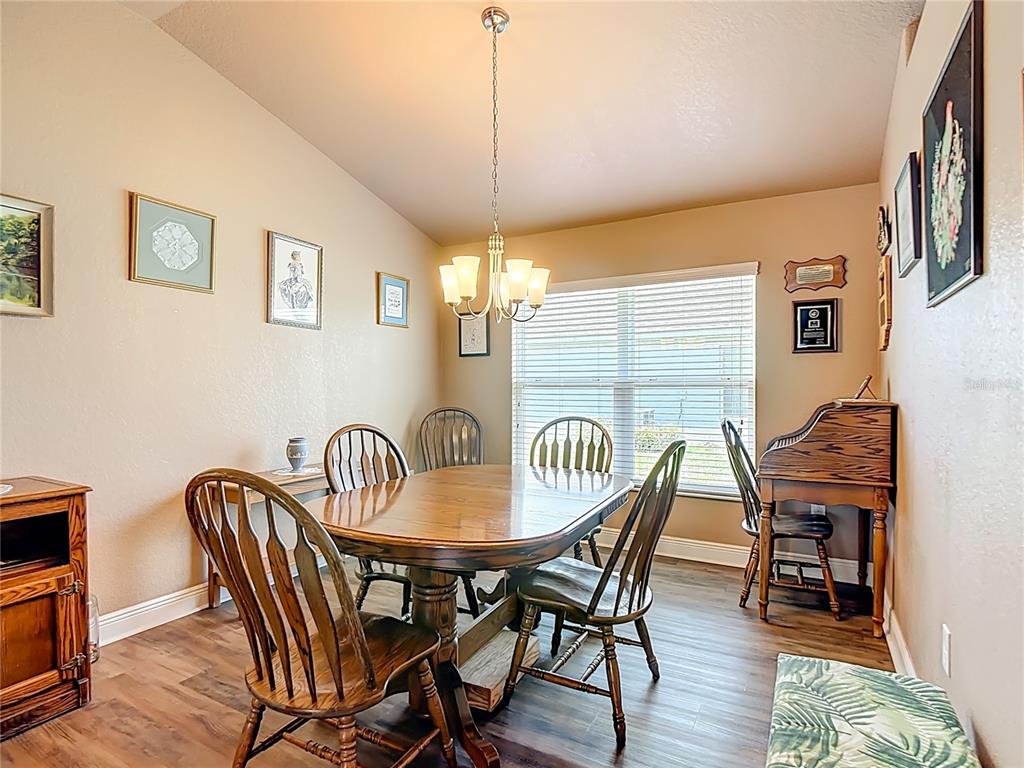1170 Legatto Loop Dundee, FL 33838 - Photo 10 of 38 a dining room with furniture and window