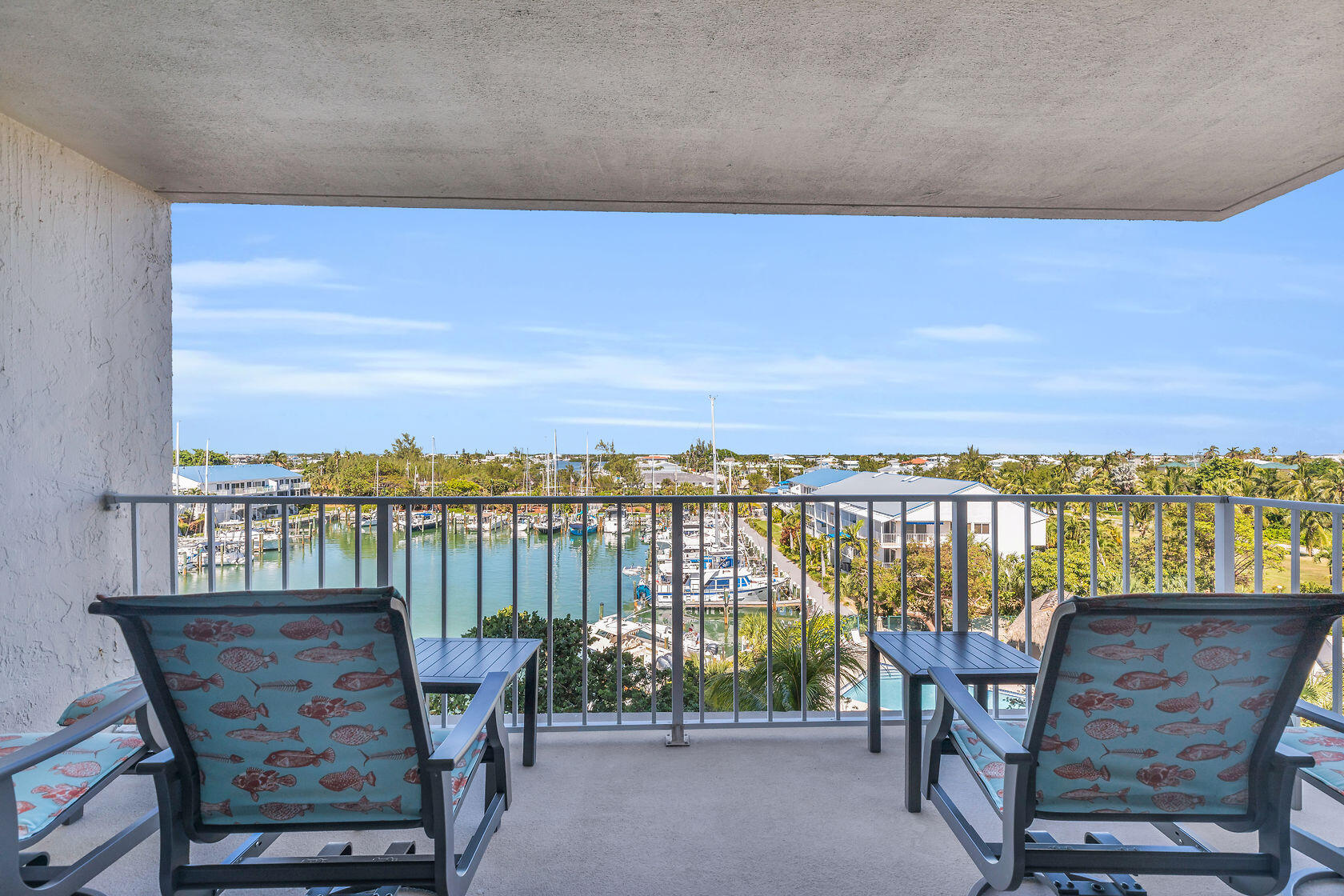 2000 Coco Plum Drive, Unit 503 Marathon, FL 33050 - Photo 11 of 37 a view of a balcony with a lake view