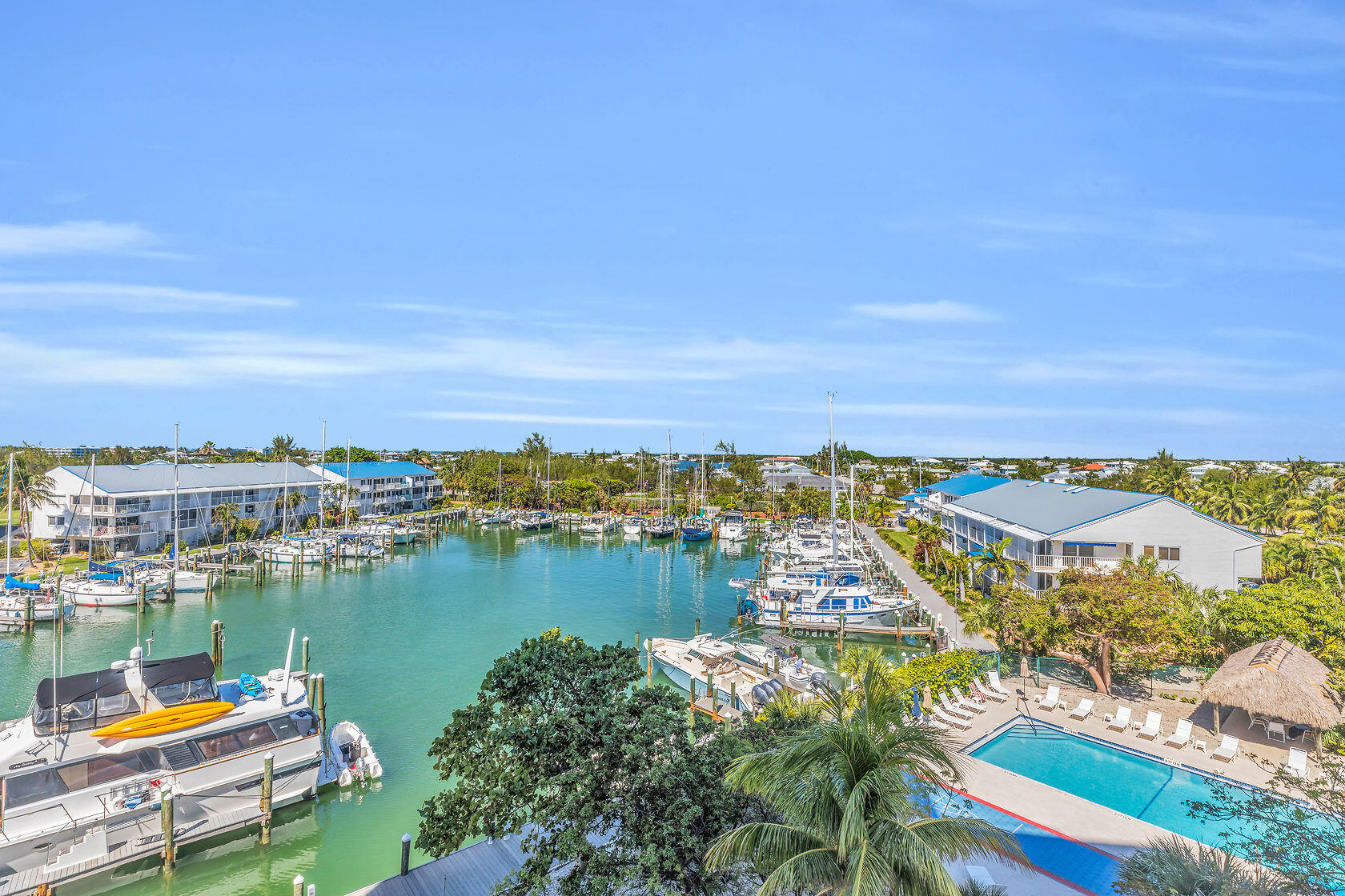 2000 Coco Plum Drive, Unit 503 Marathon, FL 33050 - Photo 12 of 37 an aerial view of a houses with a lake view