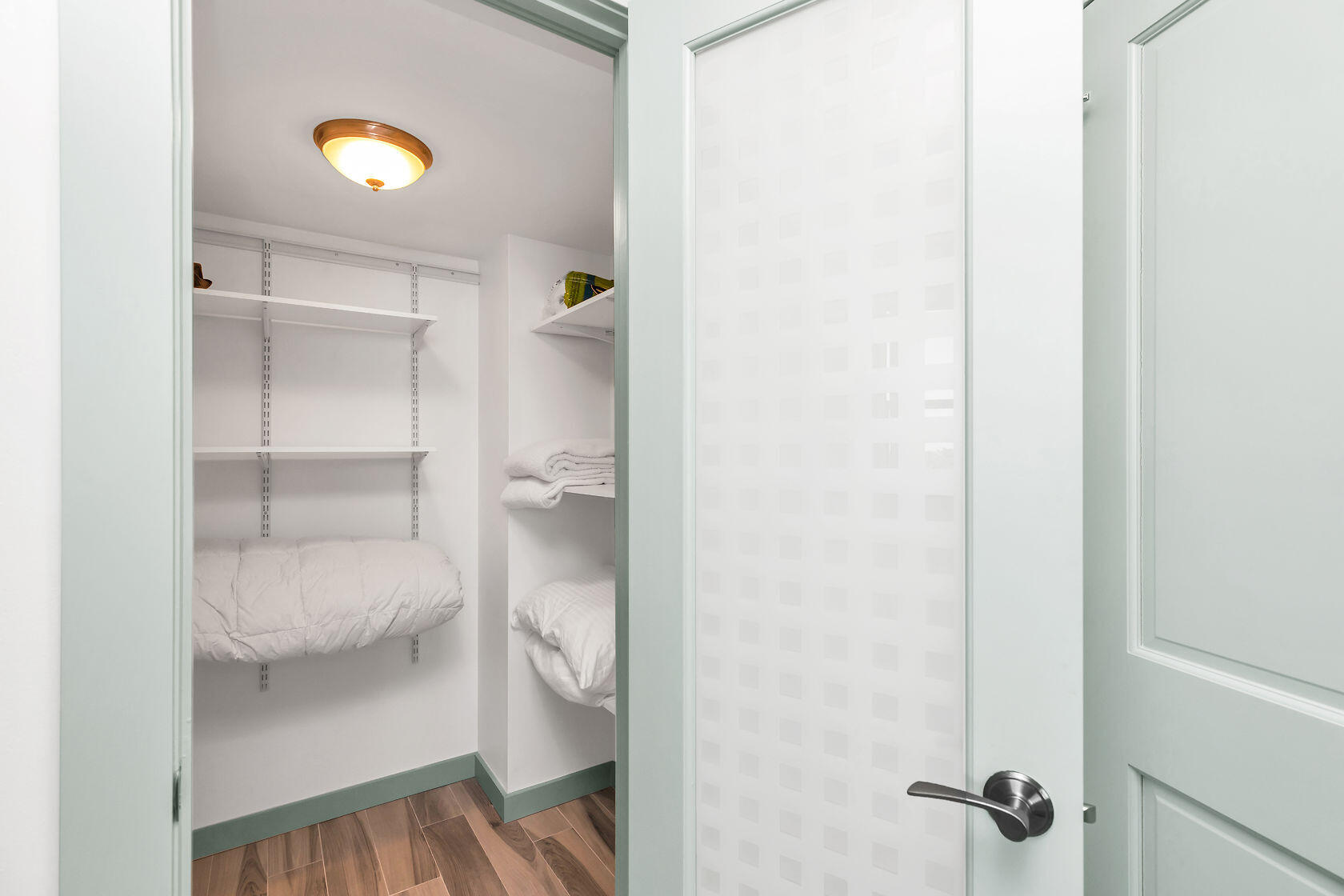 2000 Coco Plum Drive, Unit 503 Marathon, FL 33050 - Photo 17 of 37 a bathroom with a sink and a mirror