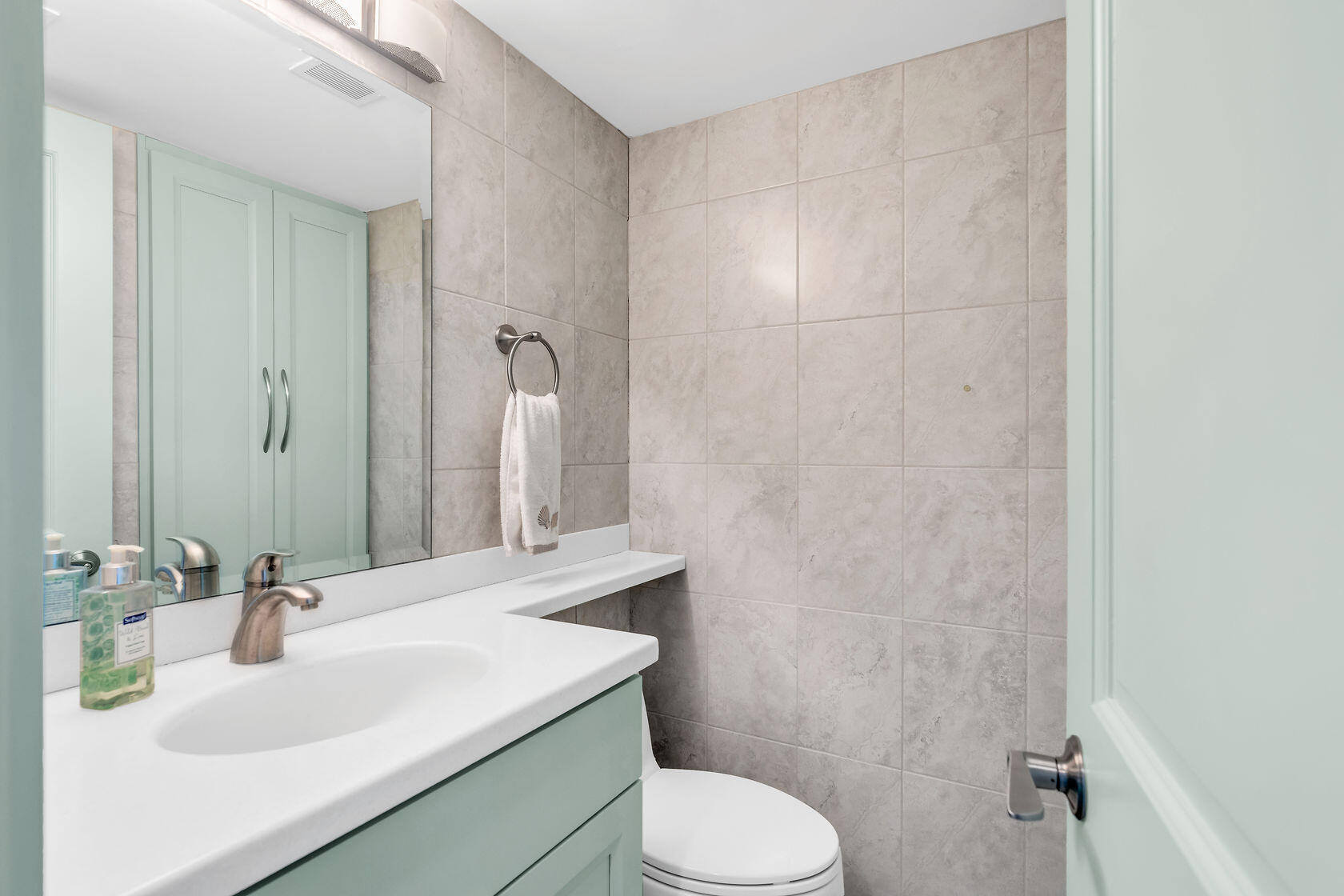 2000 Coco Plum Drive, Unit 503 Marathon, FL 33050 - Photo 19 of 37 a bathroom with a sink a toilet and shower