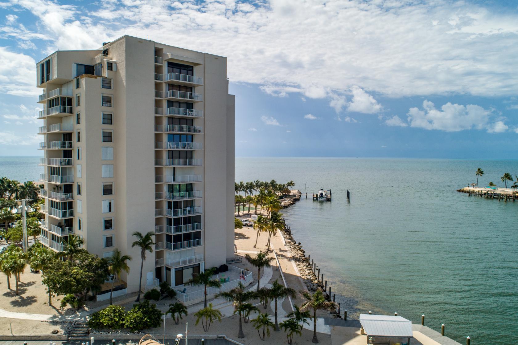 2000 Coco Plum Drive, Unit 503 Marathon, FL 33050 - Photo 2 of 37 a picture of city view with lake view