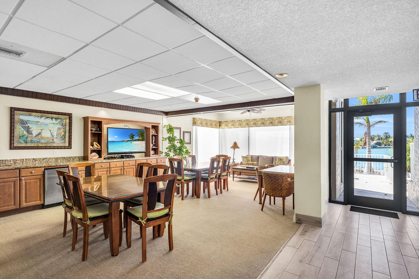 2000 Coco Plum Drive, Unit 503 Marathon, FL 33050 - Photo 21 of 37 a view of a dining room with furniture window and outside view