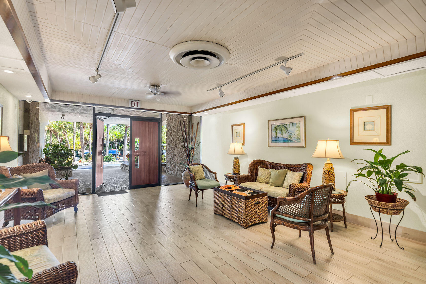 2000 Coco Plum Drive, Unit 503 Marathon, FL 33050 - Photo 3 of 37 a living room with furniture and a wooden floor