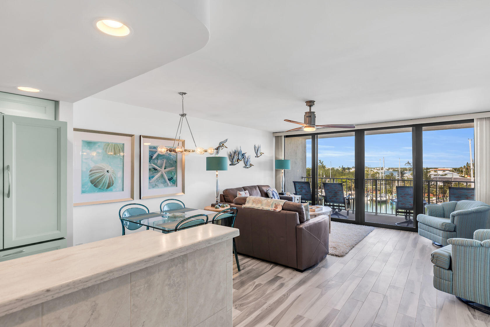 2000 Coco Plum Drive, Unit 503 Marathon, FL 33050 - Photo 4 of 37 a living room with furniture and a large window