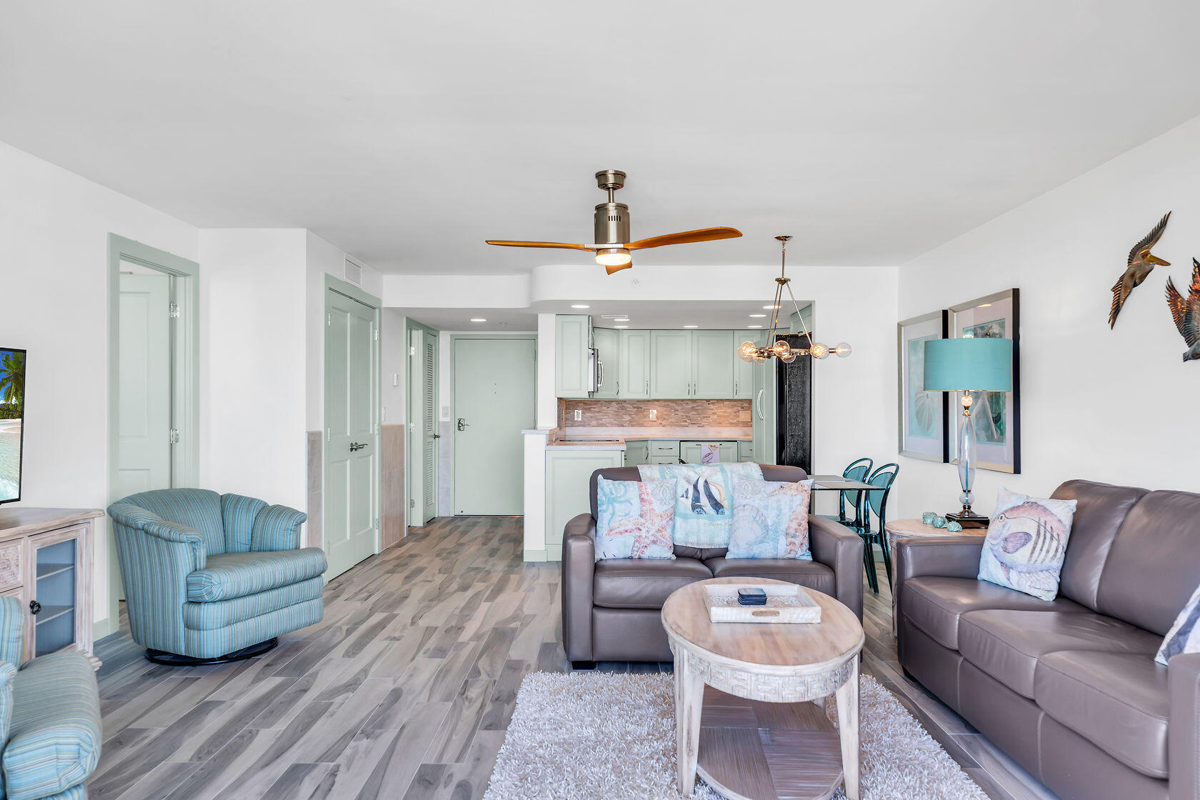 2000 Coco Plum Drive, Unit 503 Marathon, FL 33050 - Photo 10 of 37 a living room with furniture and a wooden floor