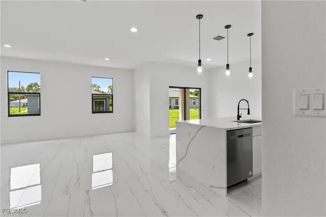 a bathroom with a double vanity sink and mirror