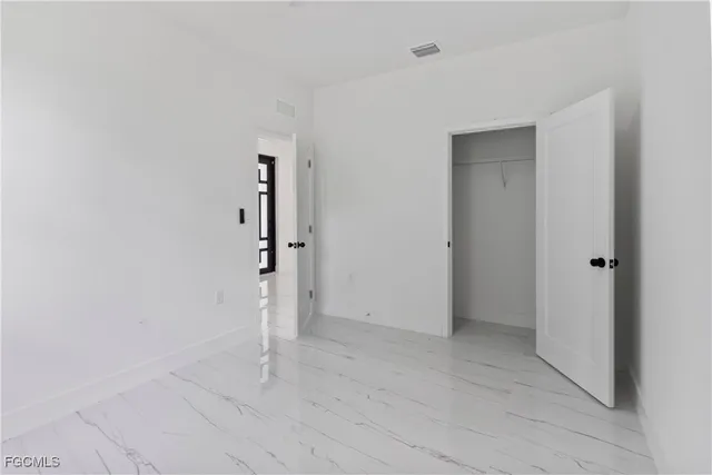 a blue house with a yard