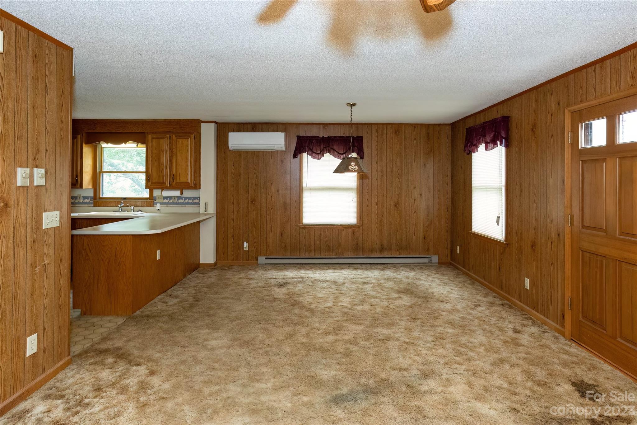 50 Morgan Branch Road Leicester, NC 28748 - Photo 3 of 41 wooden floor in an empty room with a window