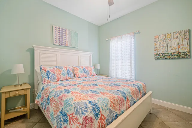 a view of a hallway and a livingroom with furniture