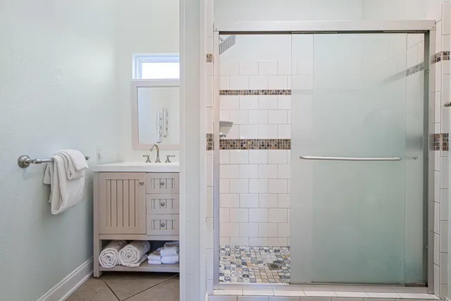 a living room with furniture and a work place